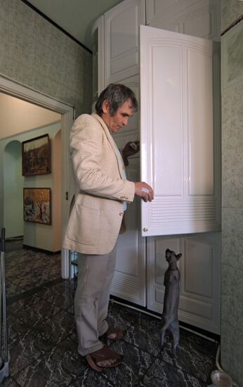 Music promoter Bari Alibasov in his home