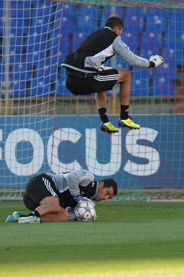 Pre-match training session at FC Olympic