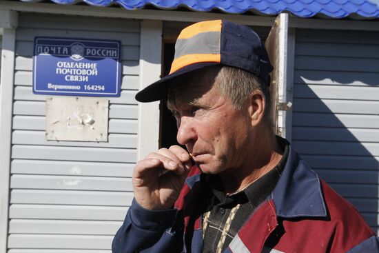 "Mail of Russia" postman makes his rounds in the village