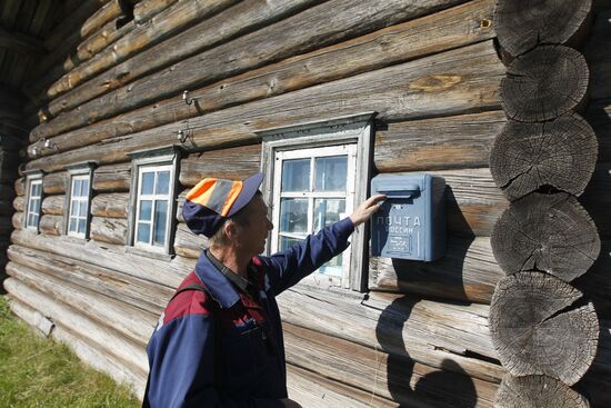"Mail of Russia" postman makes his rounds in the village