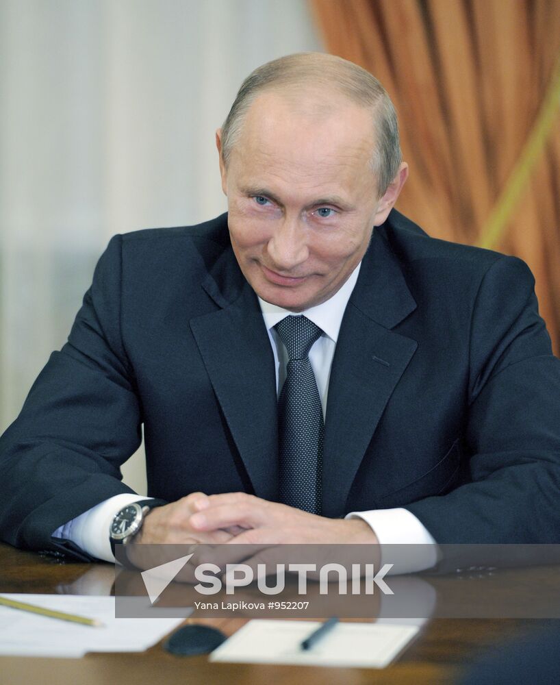 Vladimir Putin meets with Josef Ackermann