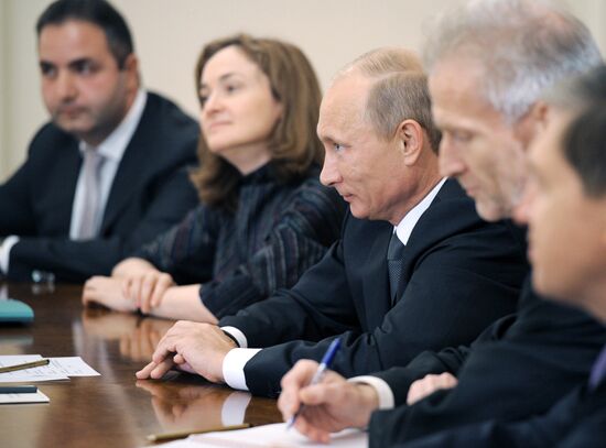 Vladimir Putin meets with Josef Ackermann