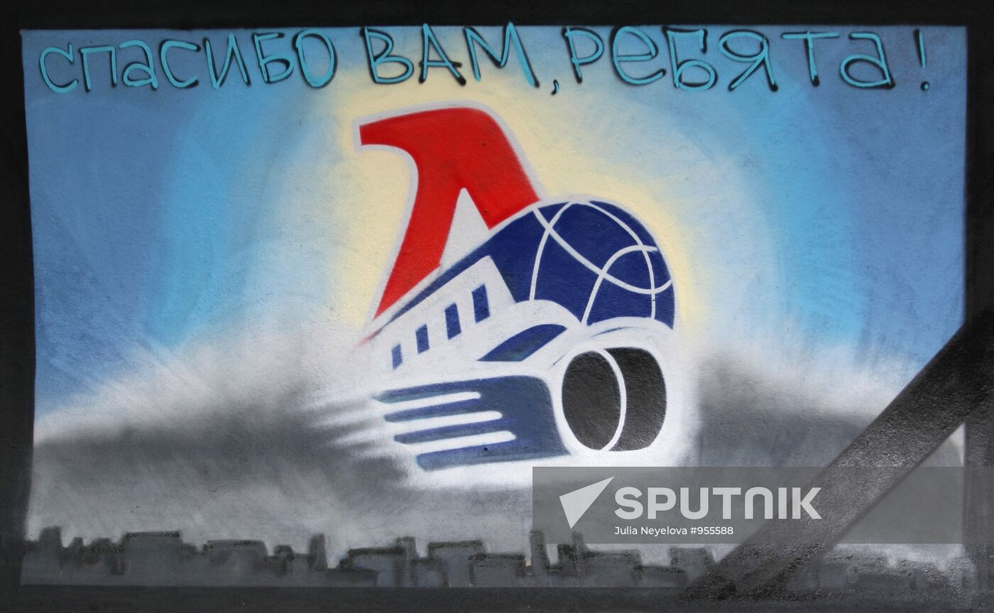 Graffiti with logo of hockey club "Lokomotiv"