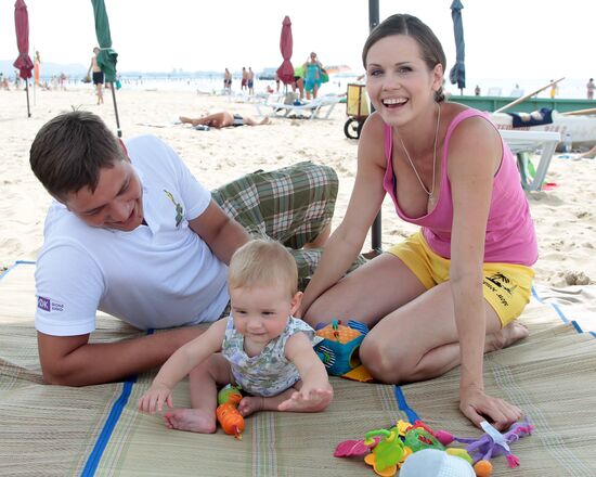 Natalya Lesnikovskaya with husband Ivan and son Yegor