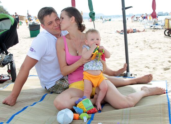 Natalya Lesnikovskaya with husband Ivan and son Yegor
