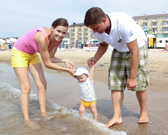 Natalya Lesnikovskaya with husband Ivan and son Yegor