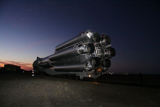 Proton-M with Kosmos satellite transported to launch pad