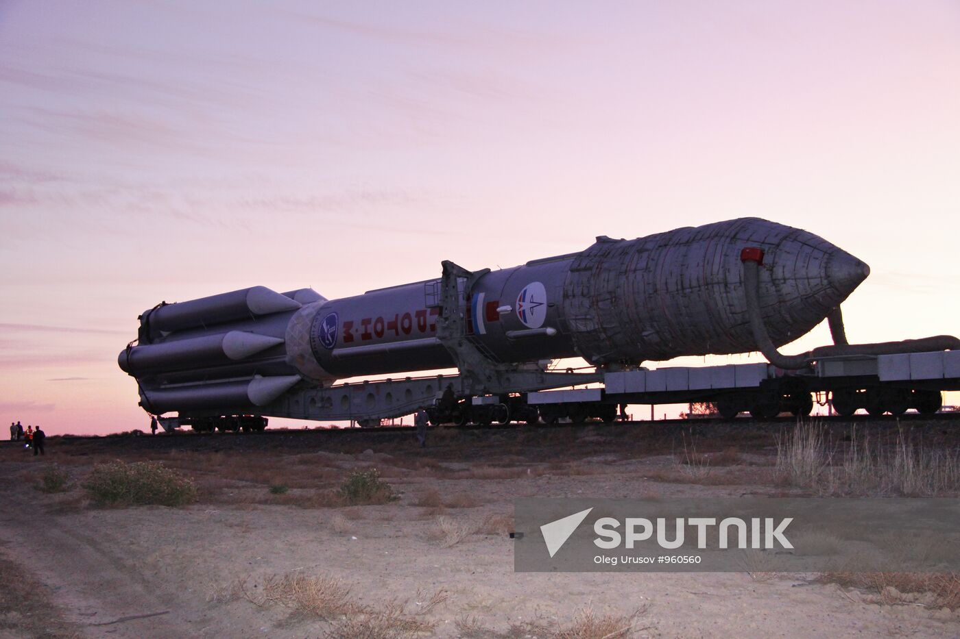 Proton-M with Kosmos satellite transported to launch pad