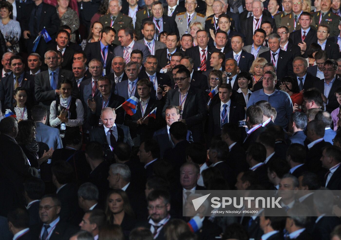 September 24, 2011. President Dmitry Medvedev and Prime Minister Vladimir Putin, left to right, center, among the delegates at the 7th United Russia Party Conference at Luzhniki Stadium. Location: Russia, Moscow. Author: Aleksey Nikolskyi/Sputnik. Medvedev and Putin at 7th United Russia Party Conference