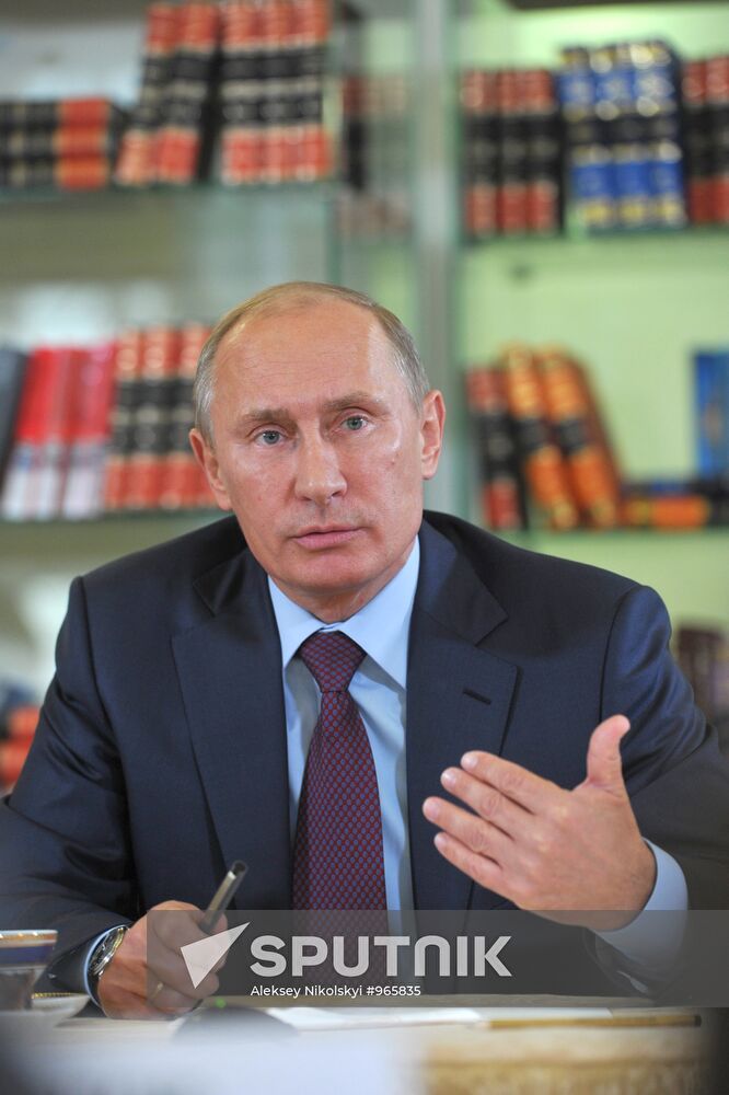 Prime Minister Vladimir Putin meets with writers