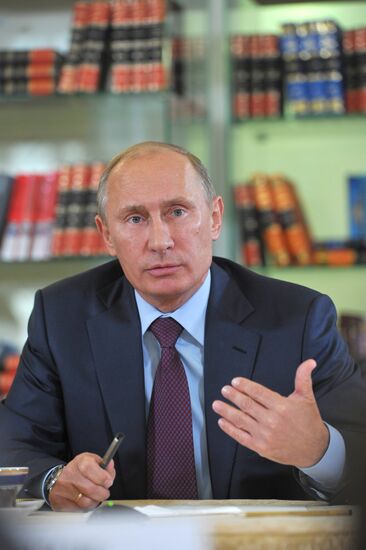 Prime Minister Vladimir Putin meets with writers