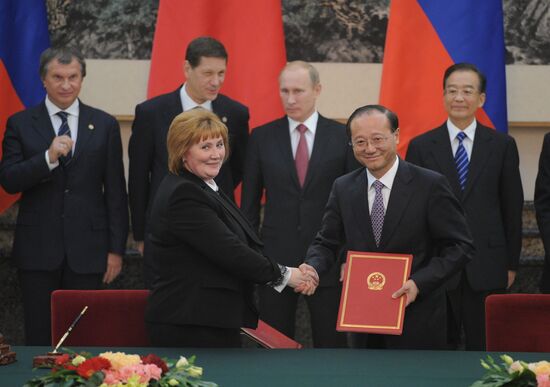 Vladimir Putin visits China
