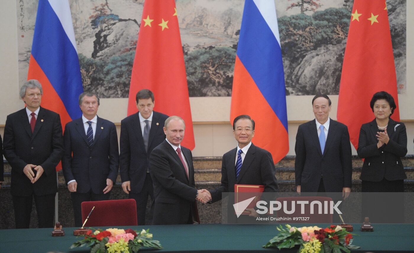 Vladimir Putin visits China