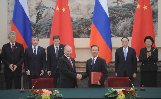 Vladimir Putin visits China