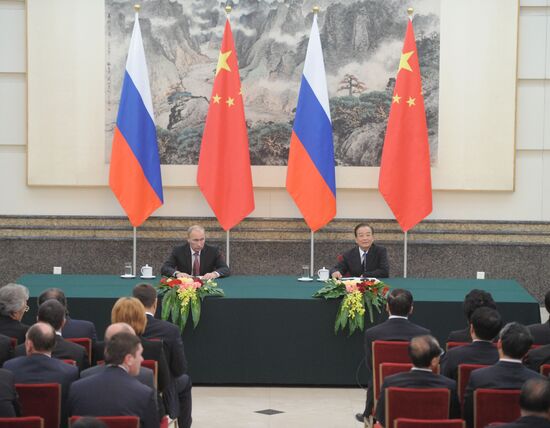 Vladimir Putin visits China