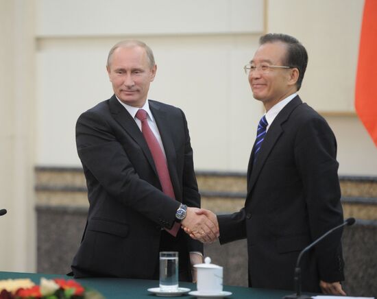 Vladimir Putin visits China