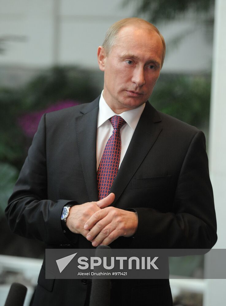 Vladimir Putin visits China