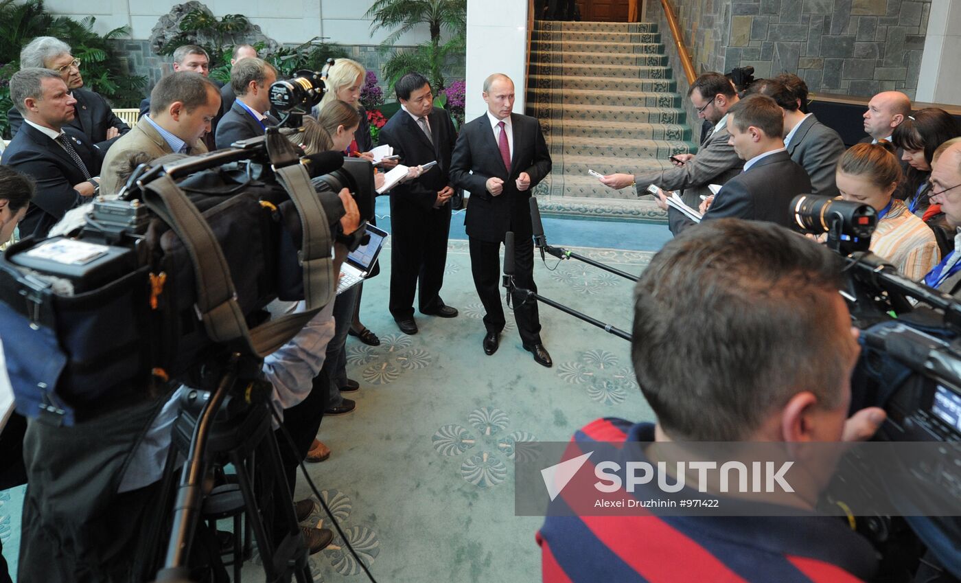 Vladimir Putin visits China