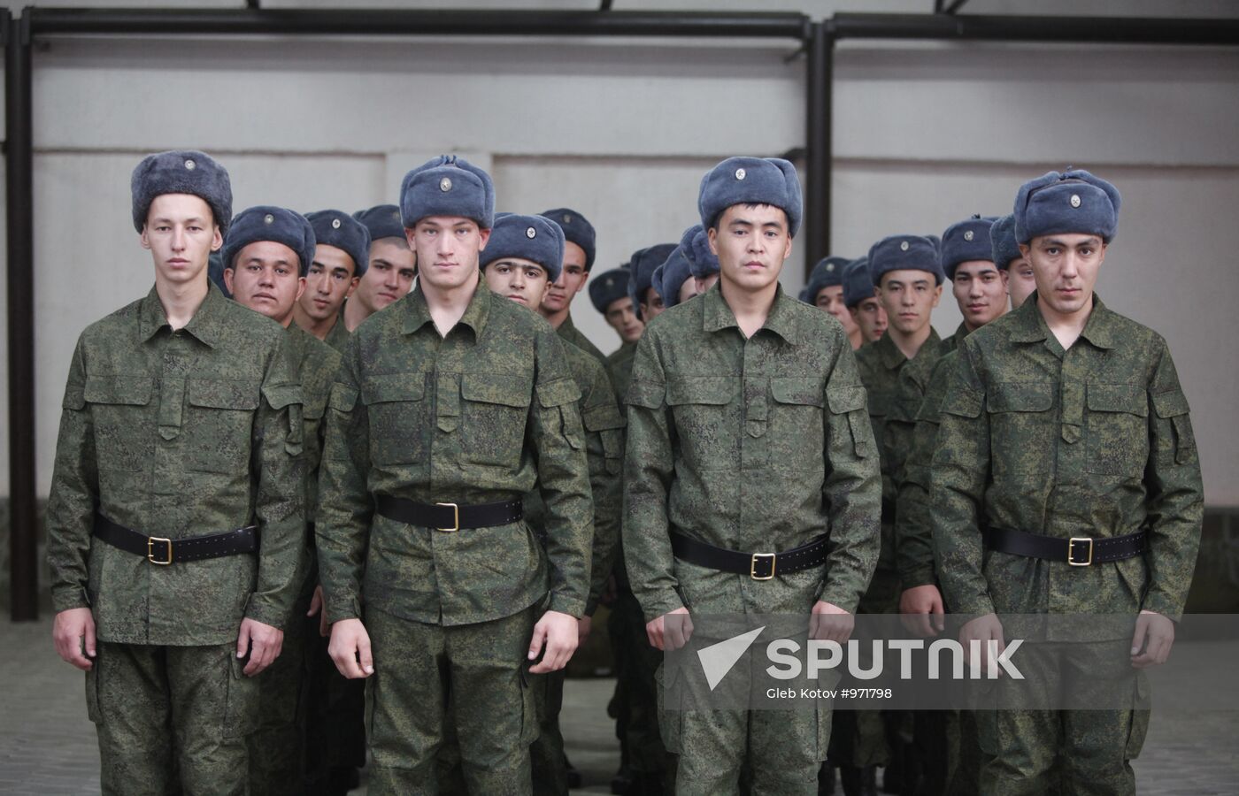 Conscripts leave for military service from recruit depot