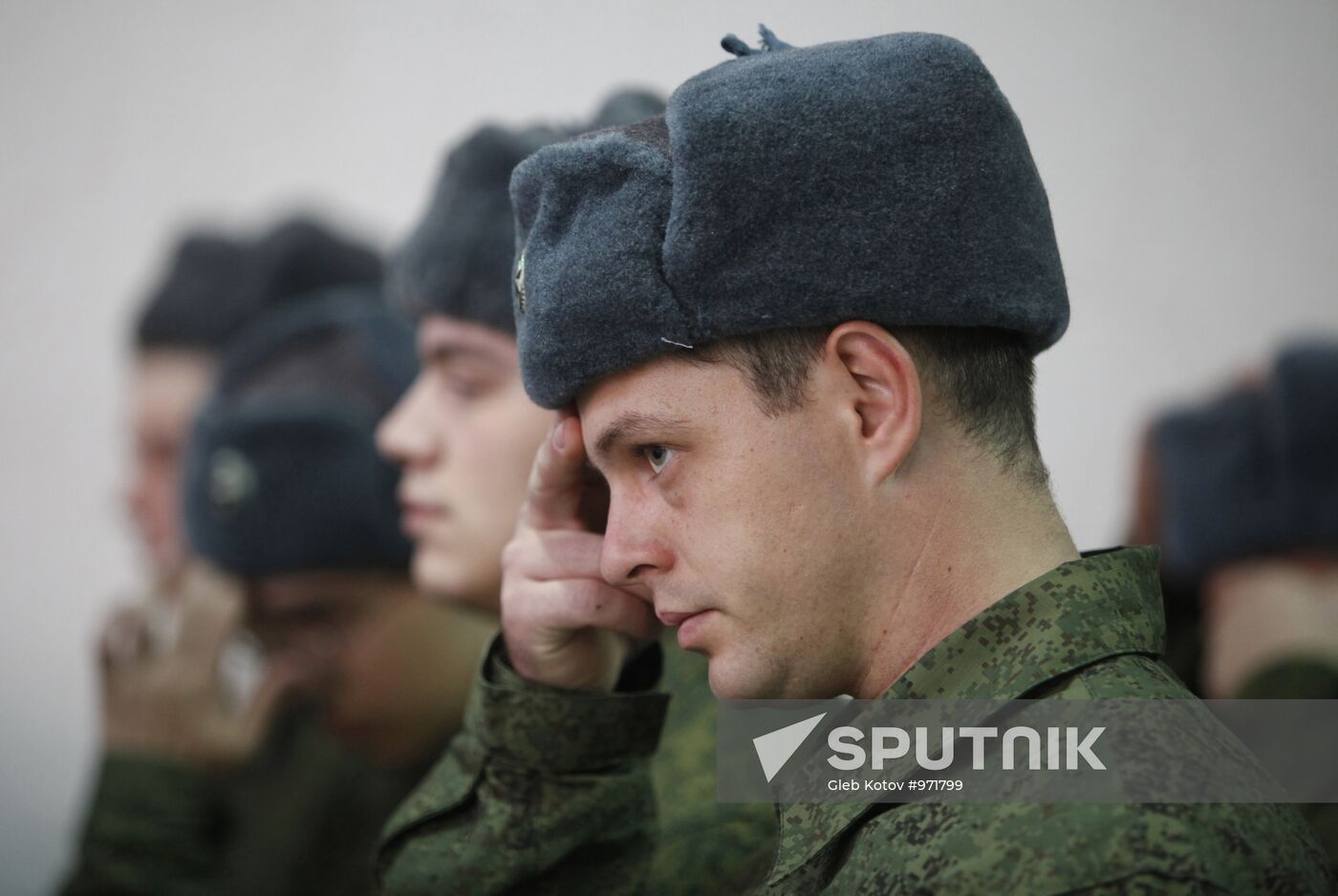 Conscripts leave for military service from recruit depot