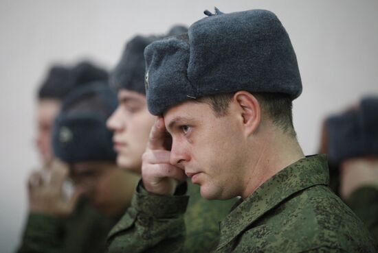 Conscripts leave for military service from recruit depot