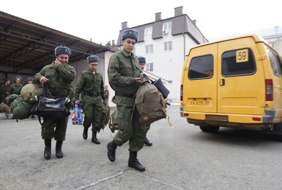 Conscripts leave for military service from recruit depot