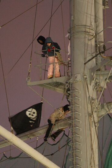 Pirate flag "Jolly Roger" is hung on cruiser "Aurora"