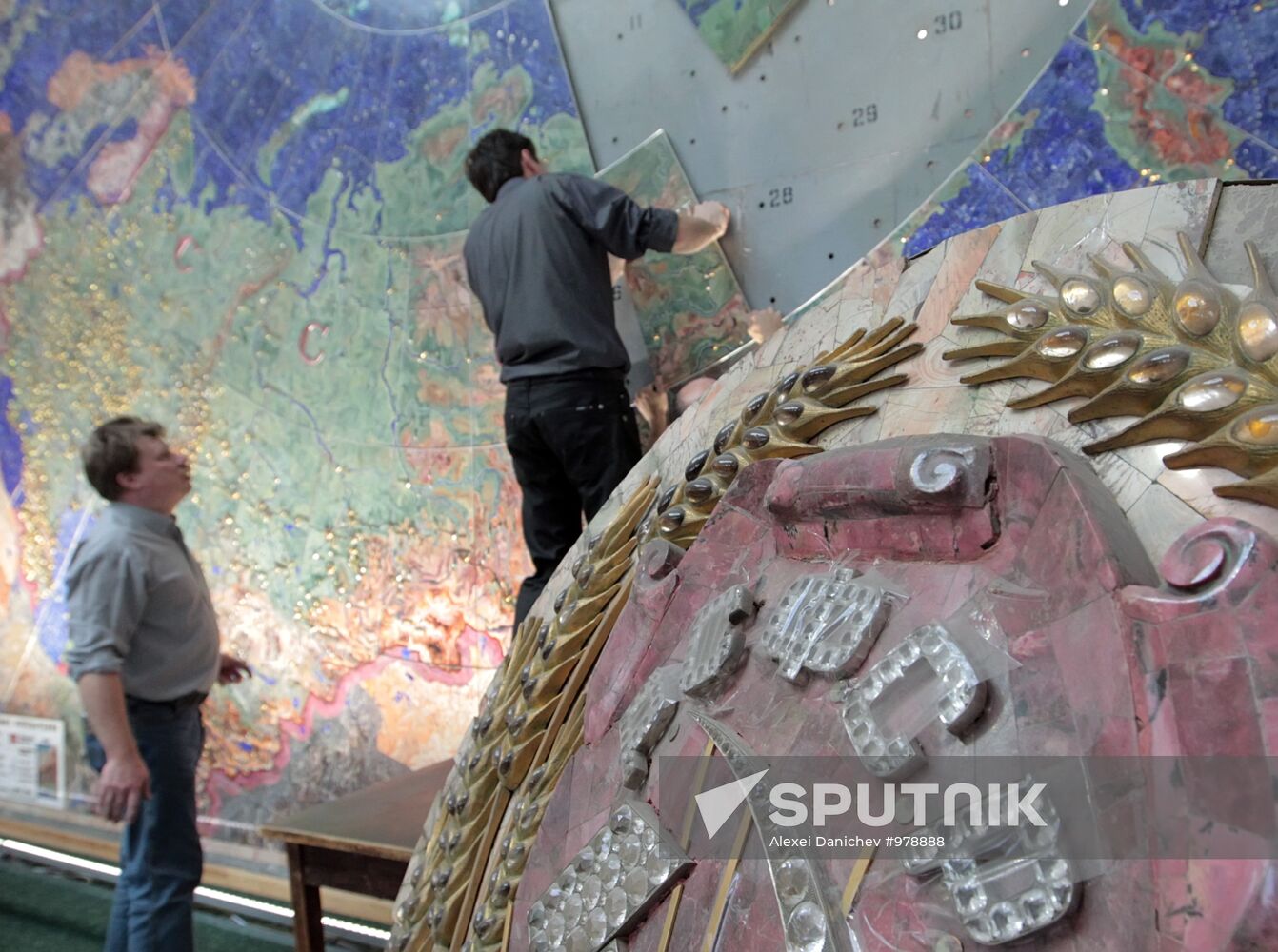 Restoration of precious stone panels "The Industry of Socialism"