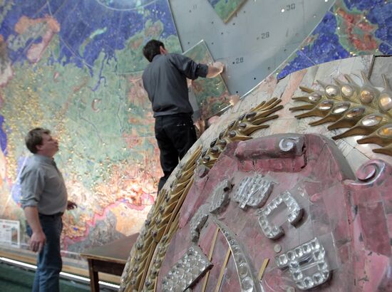 Restoration of precious stone panels "The Industry of Socialism"