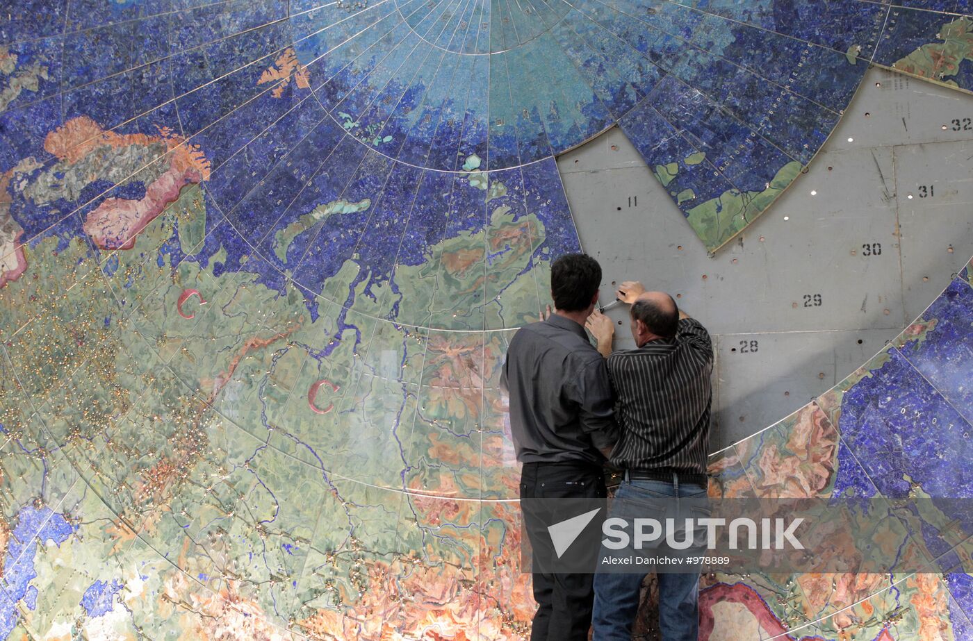 Restoration of precious stone panels "The Industry of Socialism"