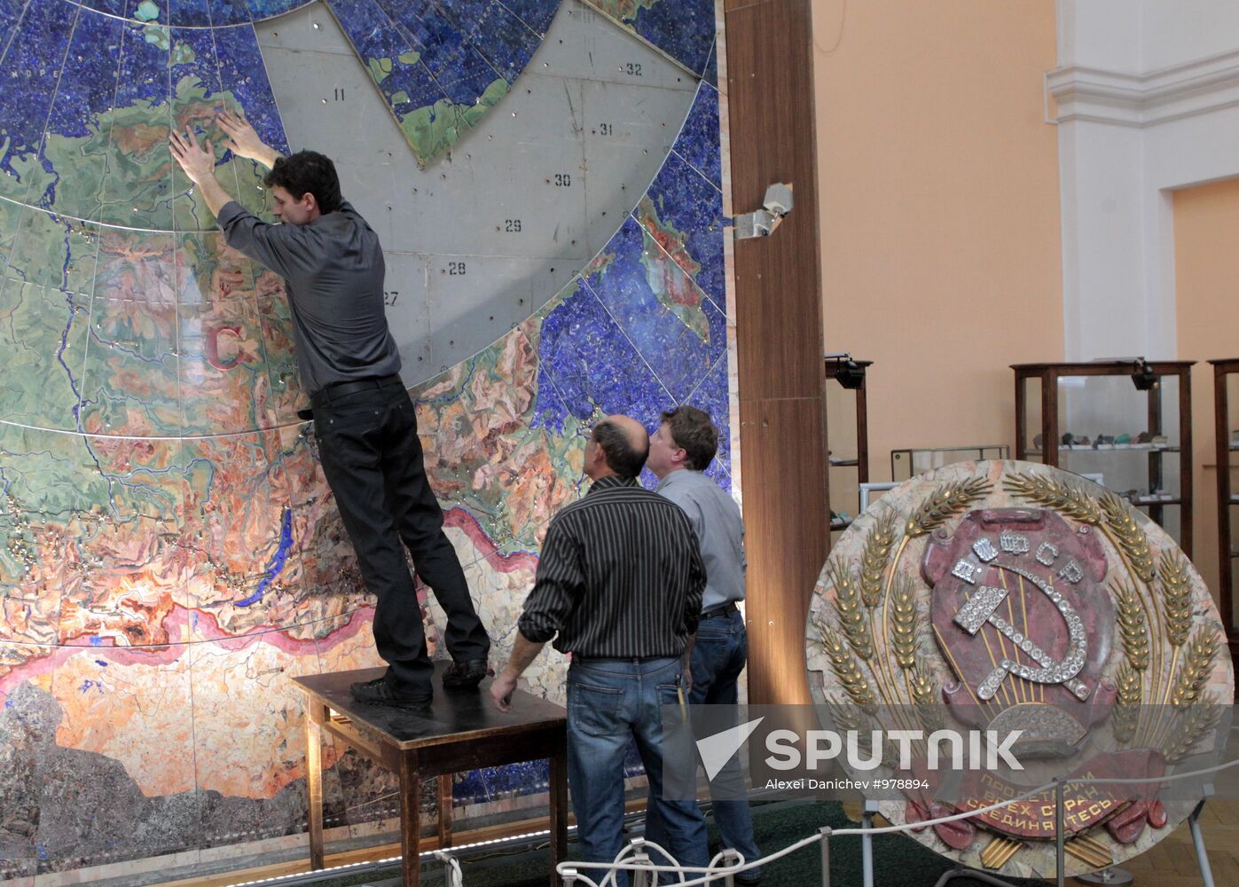 Restoration of precious stone panels "The Industry of Socialism"