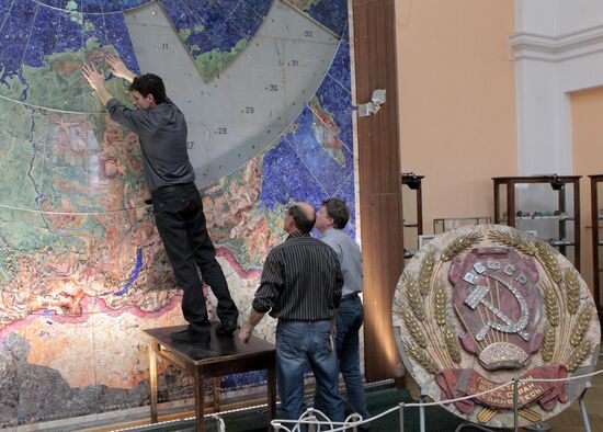 Restoration of precious stone panels "The Industry of Socialism"