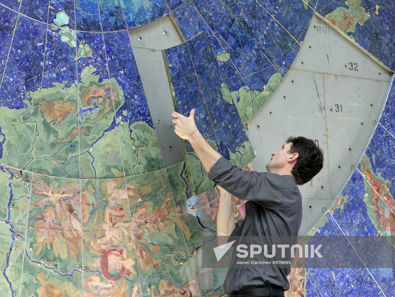 Restoration of precious stone panels "The Industry of Socialism"