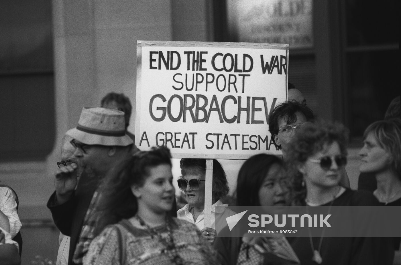 Washington people with placard