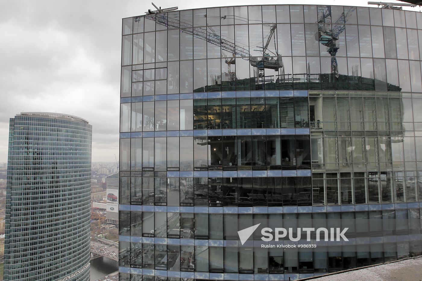 Construction of multi-story buildings in Moscow City area.