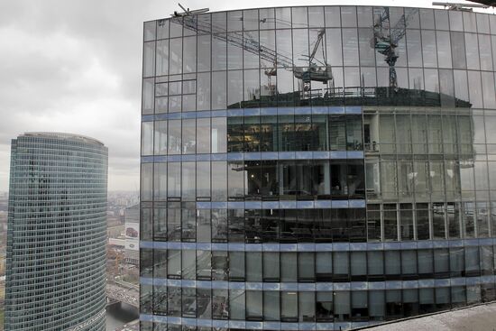 Construction of multi-story buildings in Moscow City area.