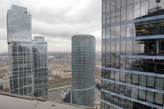 Construction of multi-story buildings in Moscow City area.
