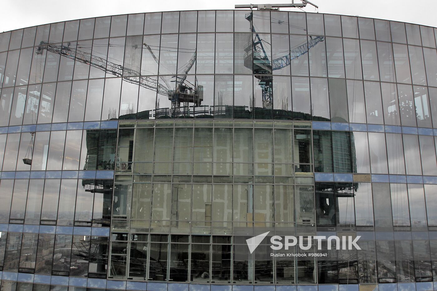 Construction of multi-story buildings in Moscow City area.