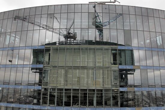 Construction of multi-story buildings in Moscow City area.
