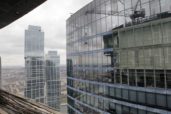 Construction of multi-story buildings in Moscow City area.