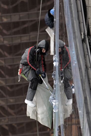 Construction of multi-story buildings in Moscow City area.