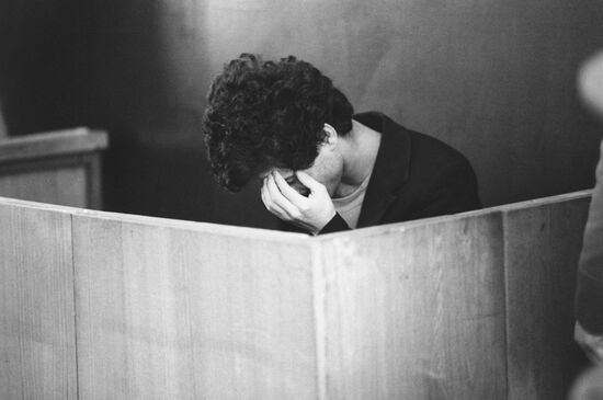 Prisoner in the dock