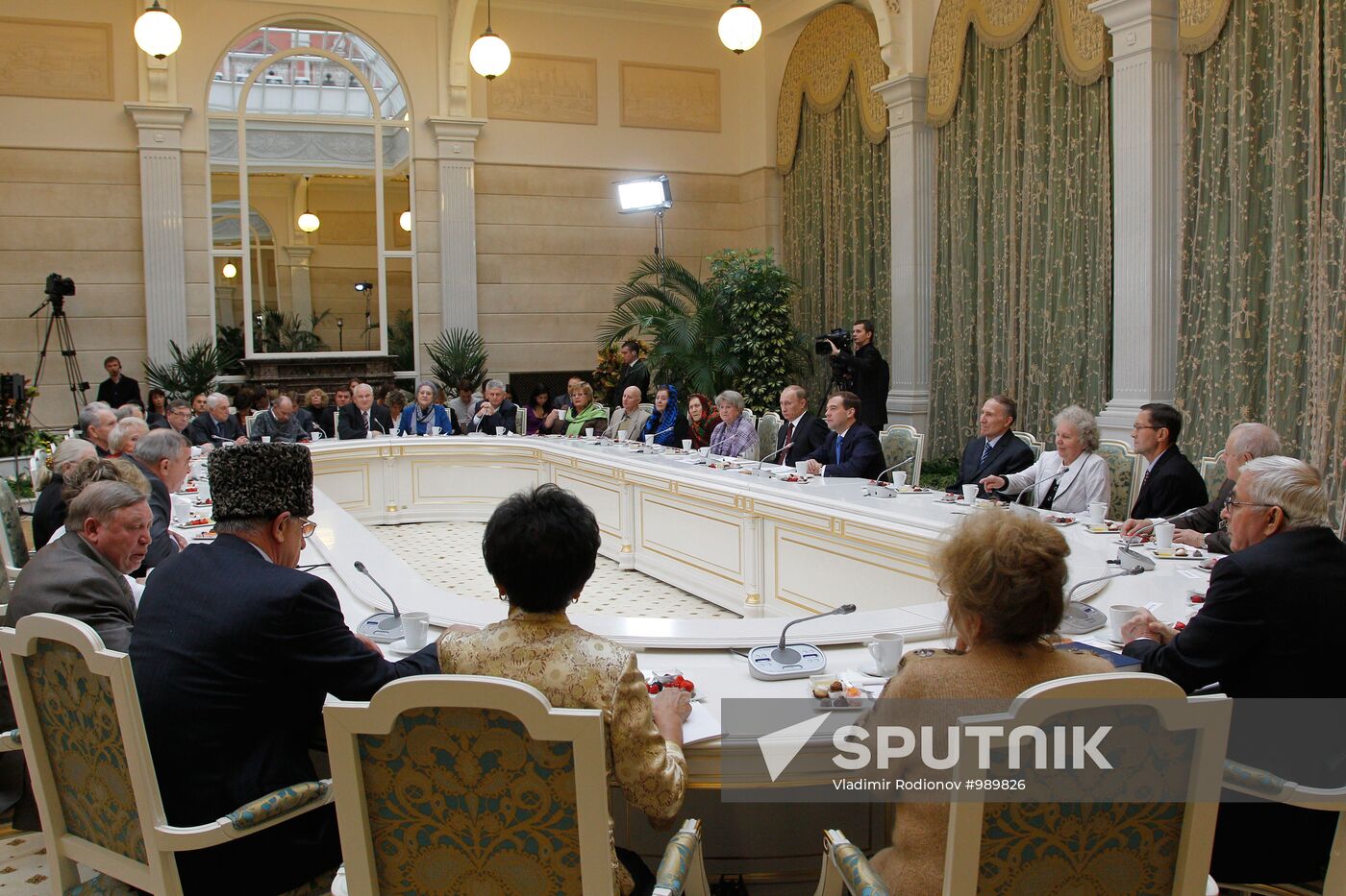 D.Medvedev and V.Putin meeting with retirees and veterans