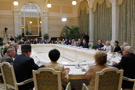D.Medvedev and V.Putin meeting with retirees and veterans