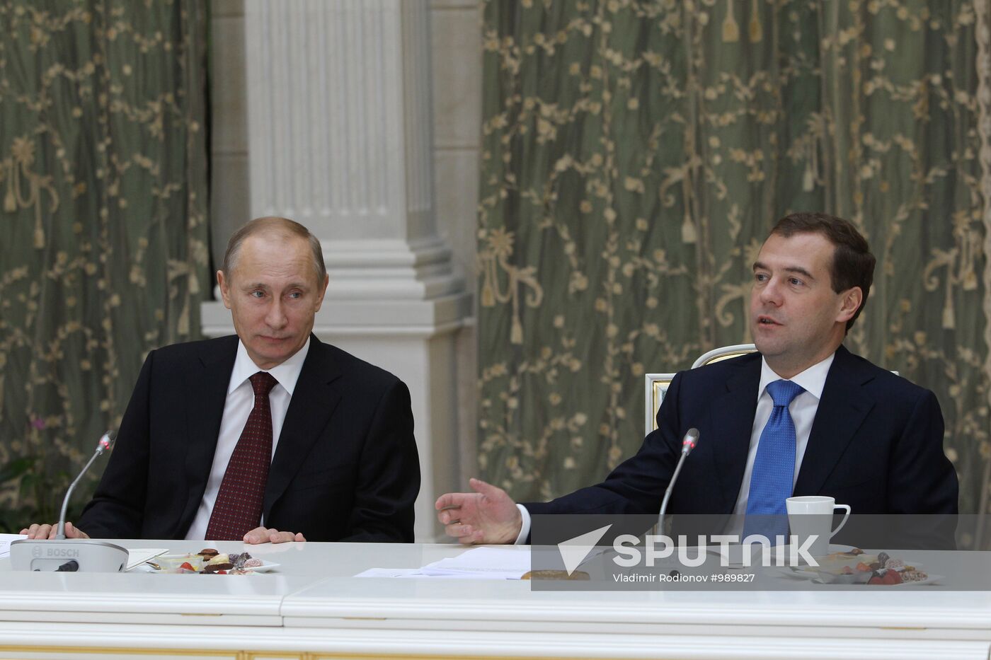 D.Medvedev and V.Putin meeting with retirees and veterans