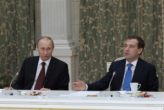 D.Medvedev and V.Putin meeting with retirees and veterans