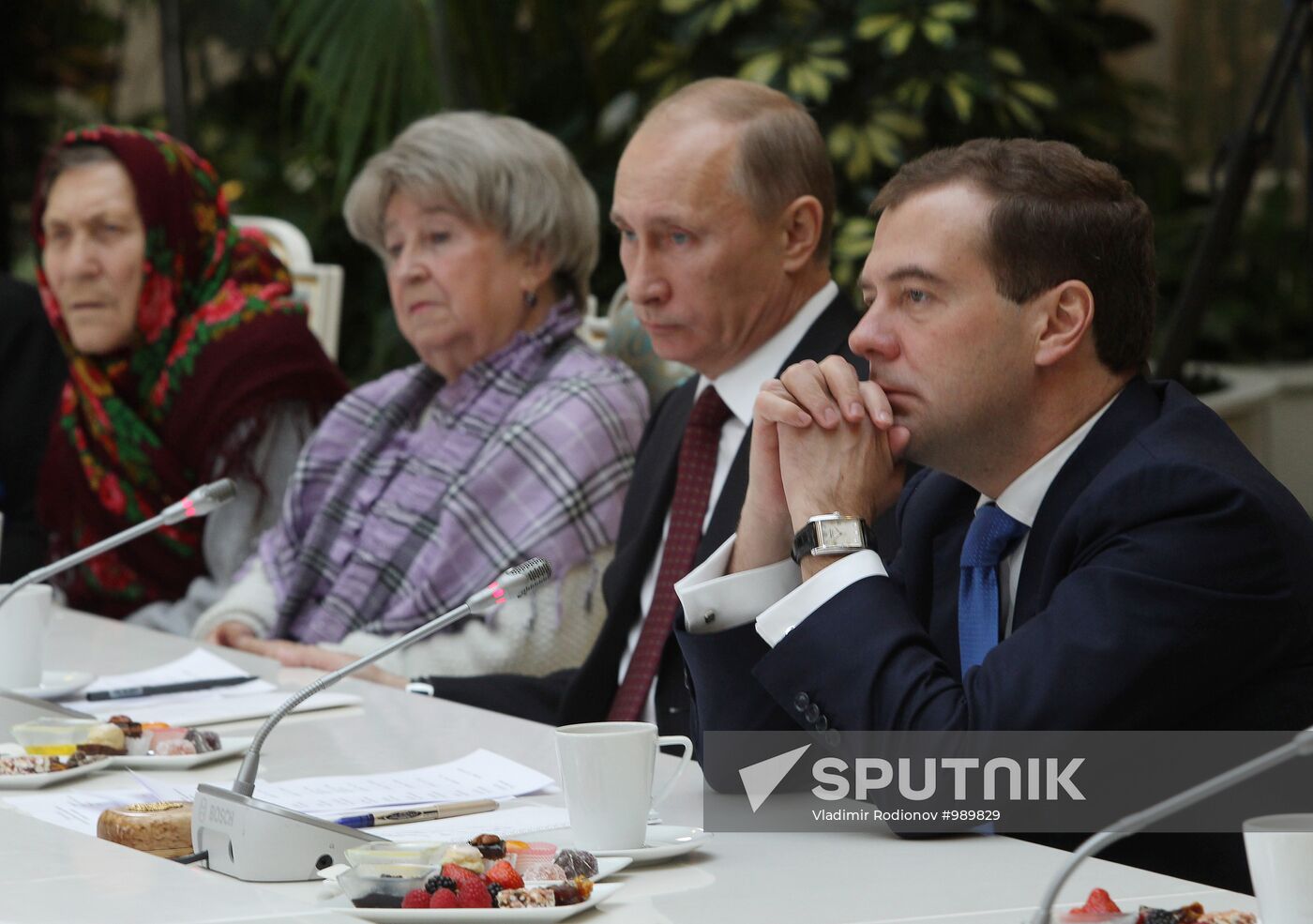 D.Medvedev and V.Putin meeting with retirees and veterans