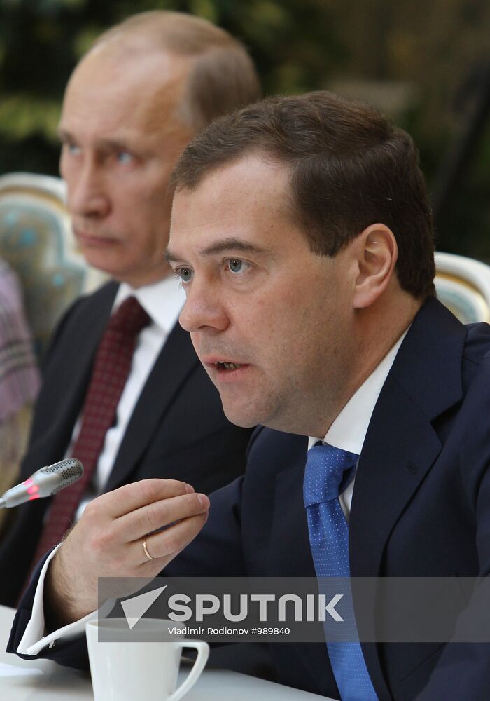 D.Medvedev and V.Putin meeting with retirees and veterans