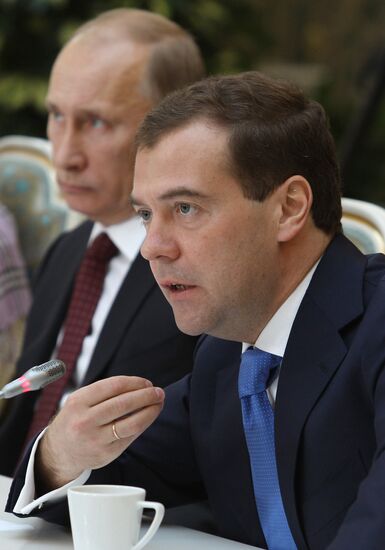 D.Medvedev and V.Putin meeting with retirees and veterans