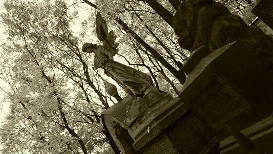 Grave sculpture at cemetery of Donskoy Monastery